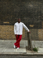 Load image into Gallery viewer, Red palm wine trousers with beige shirt
