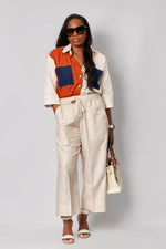 Load image into Gallery viewer, Burnt Orange Eccentric Crop Top
