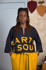 Load image into Gallery viewer, Collarless Signature Crop Top
