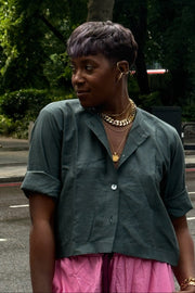 Green collarless crop top + Pink wide cropped trousers