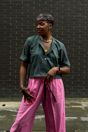 Green collarless crop top + Pink wide cropped trousers